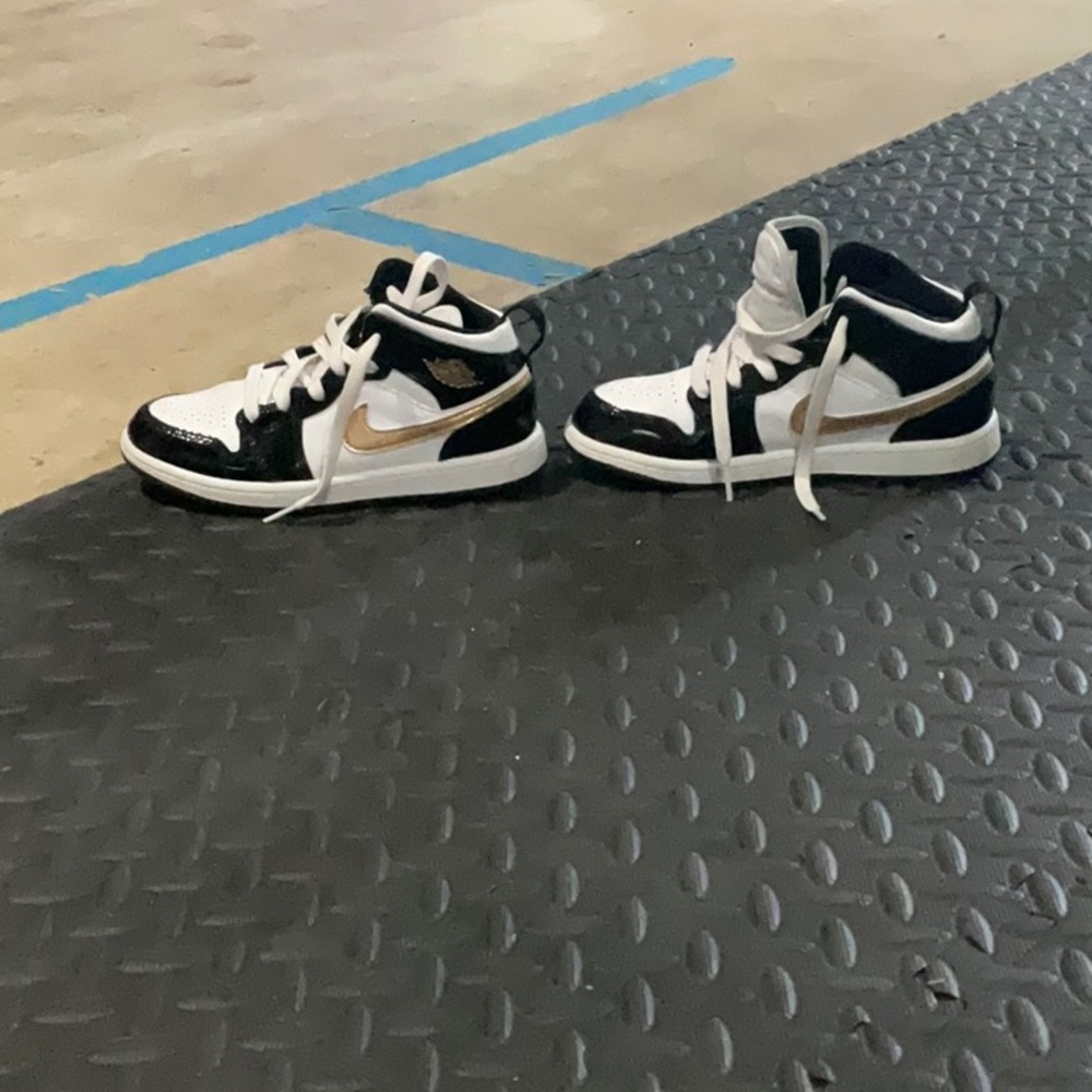 Nike Black and Gold Sneakers Classic Design